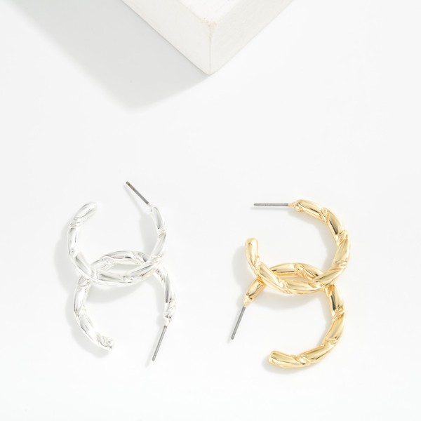 Twisted Metal Tone Hoop Drop Earring 

- Approximately 1" D 