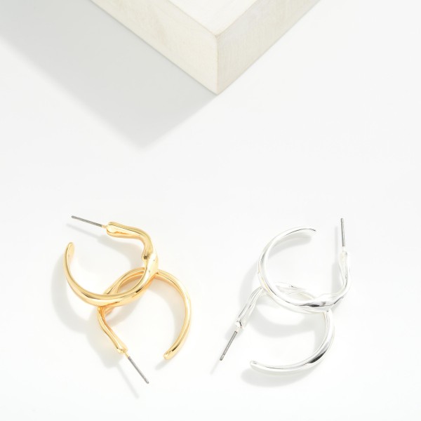 Metal Tone Hoop Earrings Featuring Twisted Metal Detail 

- Approximately 1" D