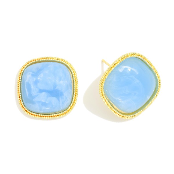 Natural Stone Post Drop Earring Featuring Metal Tone Border 

- Approximately .50" D 
