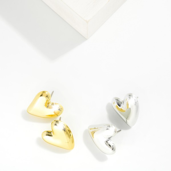 Metal Tone Puffy Heart Drop Earring 

- Approximately 1" L 