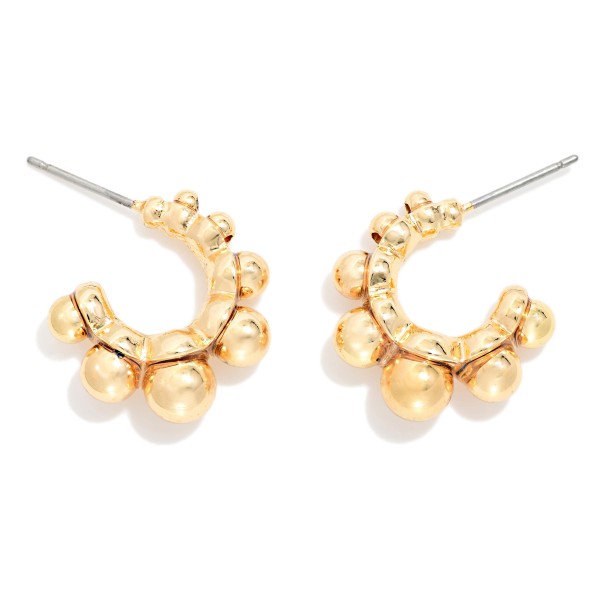 Metal Tone Graduated Bead Hoop Earrings 

- Approximately .5" D