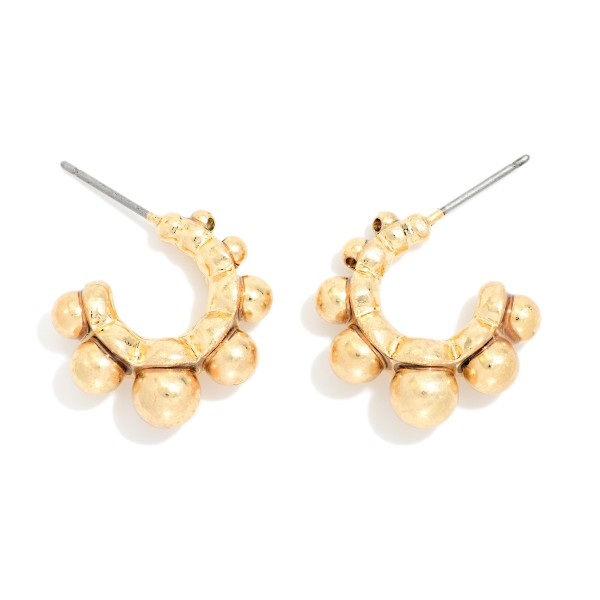 Metal Tone Graduated Bead Hoop Earrings 

- Approximately .5" D