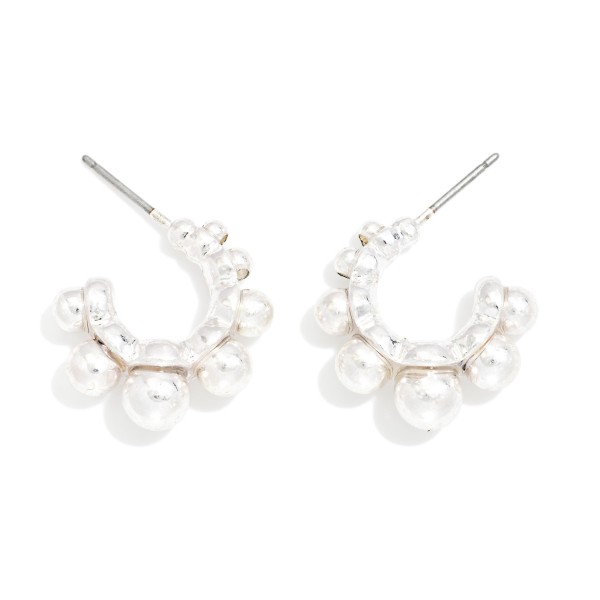 Metal Tone Graduated Bead Hoop Earrings 

- Approximately .5" D