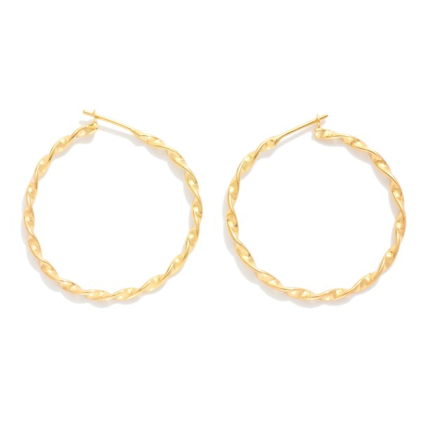 Twisted Metal Hoop Earrings  

- Gold Filled 
- Approximately 1" D
