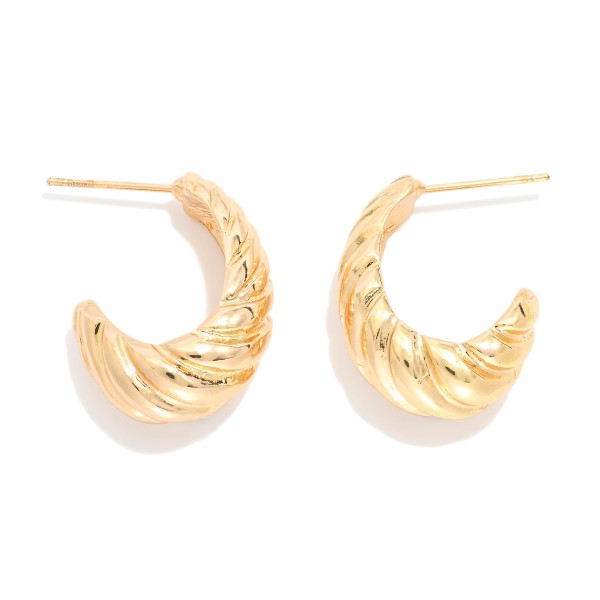 Metal Tone Ribbed Tapered Hoop Earrings 

- Approximately .75" D