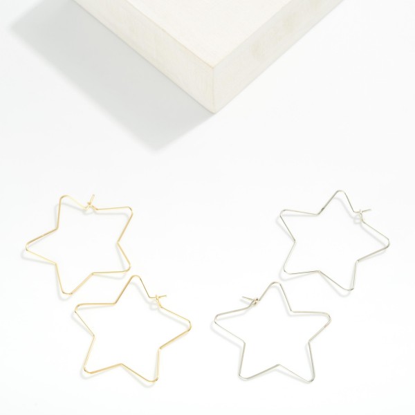 Metal Tone Wire Star Hoop Earrings 

- Approximately 1.25" D