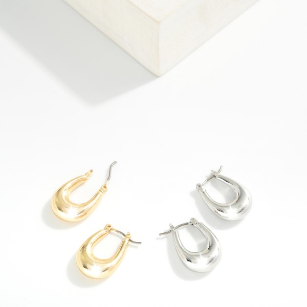 Tapered Metal Hoop Earrings 

- Approximately .25" D