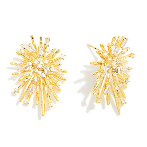 Metal Tone Starburst Post Drop Earring Featuring Crystal Accents 

- Approximately 1" L 
