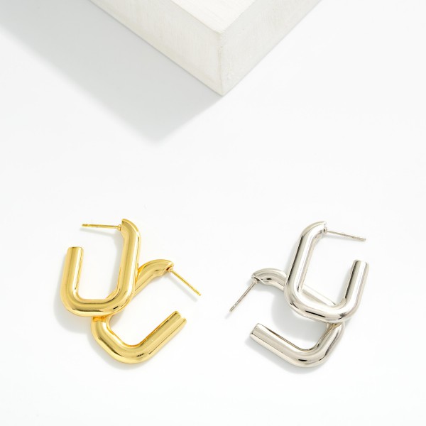 Metal Tone Rounded Rectangular Hoop Earrings 

- Approximately 1.5" L 