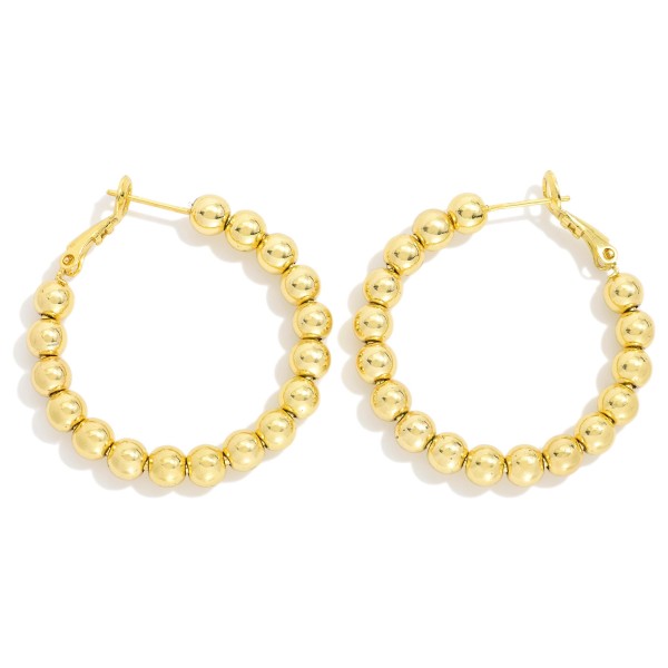 Metal Tone Beaded Hoop Earrings 

- Gold Dipped
- Approximately 1" D