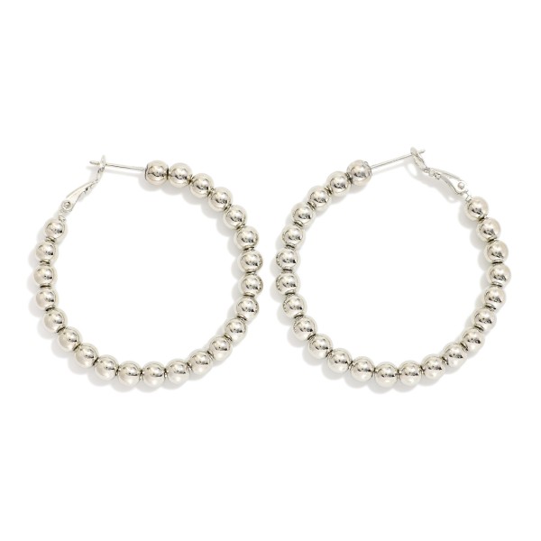 Metal Tone Beaded Hoop Earrings 

- Gold Dipped
- Approximately 1.5" D