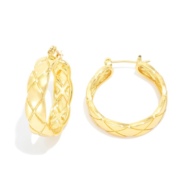Quilted Metal Tone Hoop Earrings

- Gold Dipped 
- Approximately 1" D