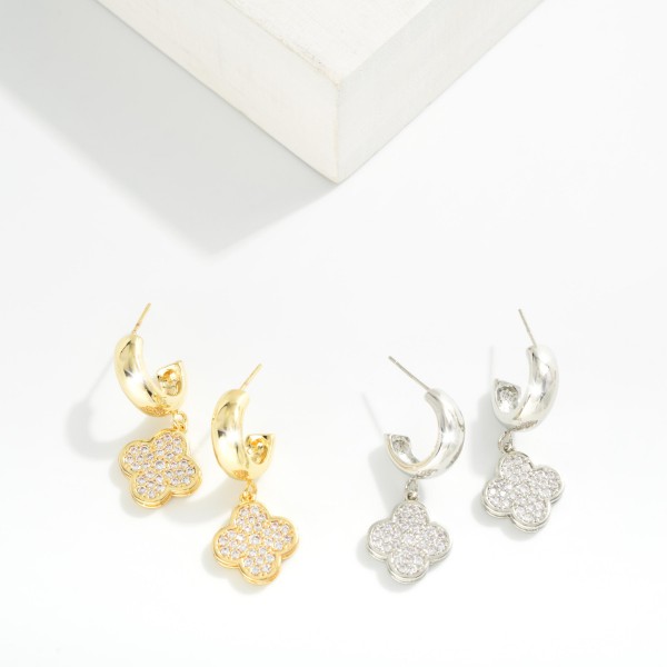 Metal Tone Hoop Earrings Featuring Cubic Zirconia Clover Dangle 

- Gold Dipped
- Approximately .75" D