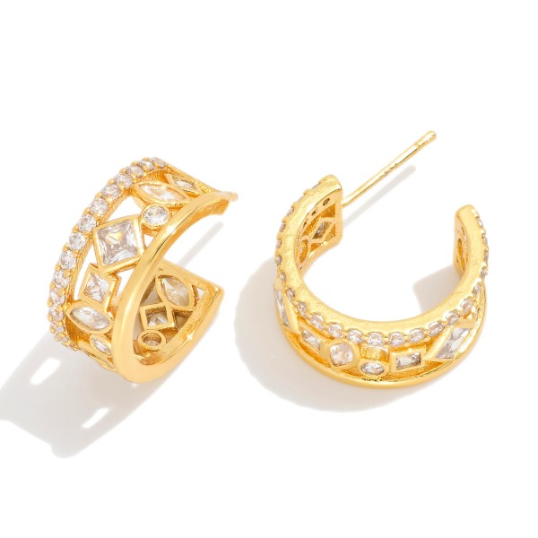 Metal Tone & Cubic Zirconia Hoop Earrings

- Gold Dipped 
- Approximately .5" D