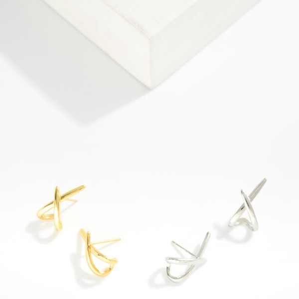 Metal Tone Criss Cross Cuff Earrings 

- Gold Dipped 
- Approximately .75" L