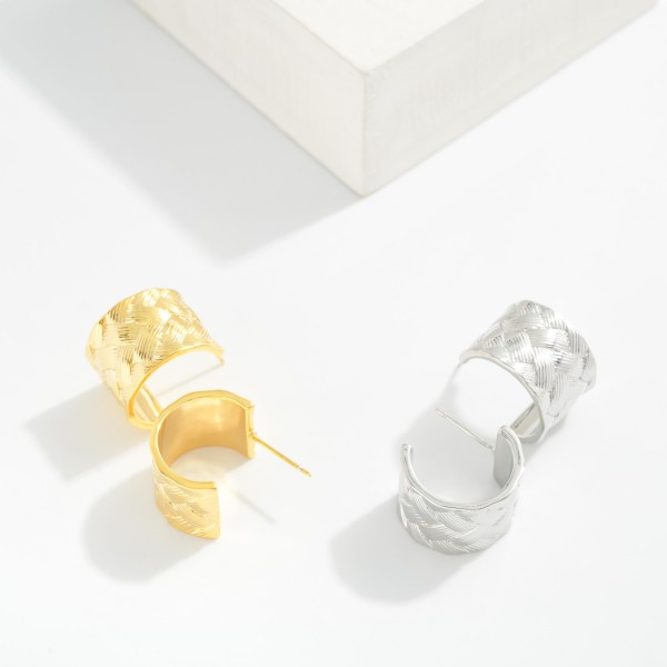 Metal Tone Woven Textured Hoop Drop Earrings 

- Approximately .5" L 
- 14K Gold Dipped
- Brass Base 
- Hypoallergenic