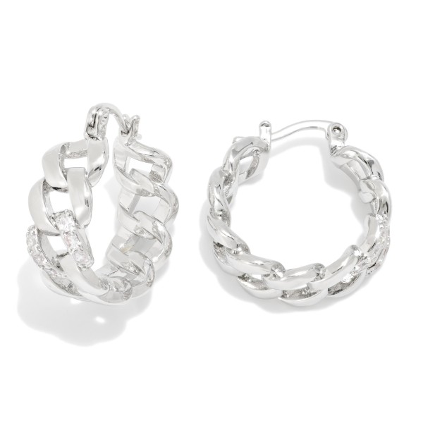 Metal Tone Chain Link Huggie Hoop Drop Earrings Featuring Cubic Zirconia 

- Approximately 1." D 
- Gold Dipped
- Brass Base 
- Hypoallergenic