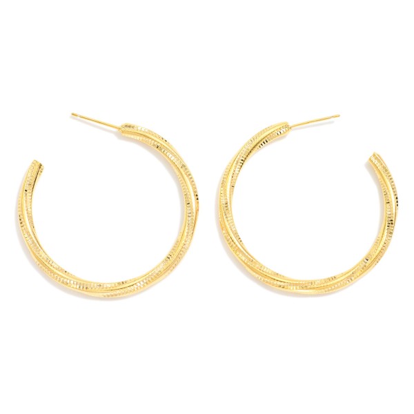 Textured Twisted Metal Tone Hoop Drop Earrings

- Approximately 1.5" D 
- 14K Gold Dipped
- Brass Base 
- Hypoallergenic