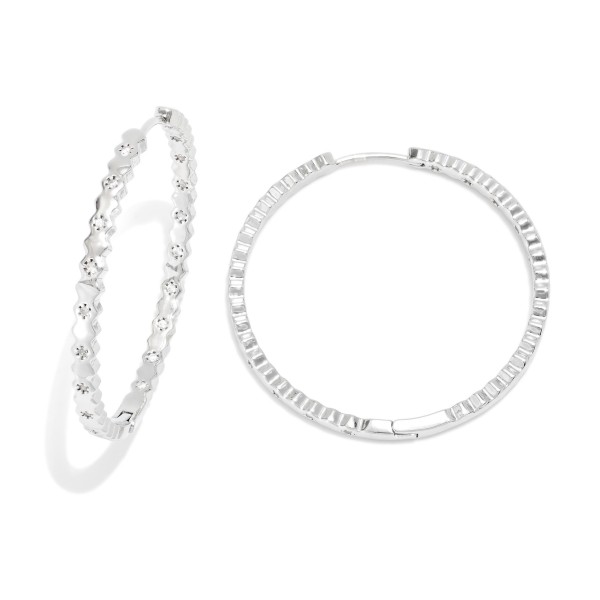 Metal Tone Zig Zag Huggie Hoop Drop Earrings Featuring Cubic Zirconia 

- Approximately 1." D 
- Gold Dipped
- Brass Base 
- Hypoallergenic