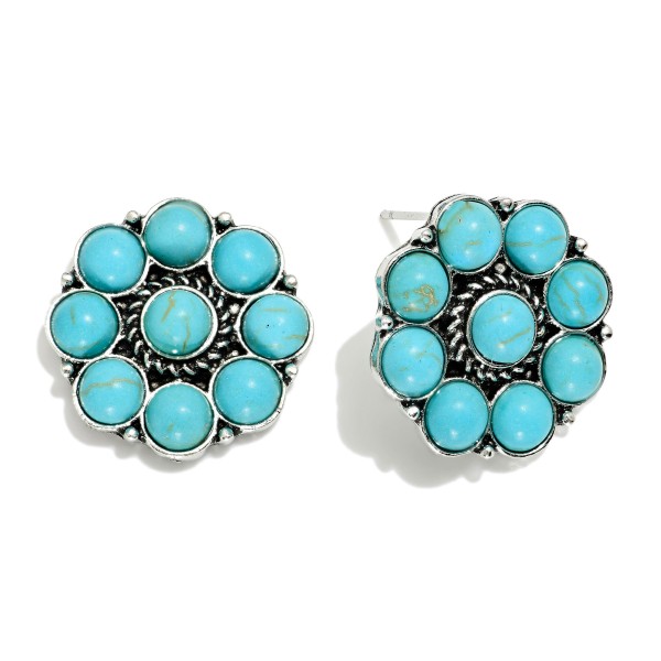 Metal Tone Flower Post Drop Earring Featuring Engraved Stones 

- Approximately .75" D 