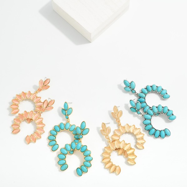 Metal Tone Linked Drop Earring Featuring Stone Accents 

- Approximately 2.75" L 