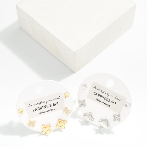 Do Everything In Love Metal Tone & Rhinestone Clover Stud Earrings

- Approximately .25" L 