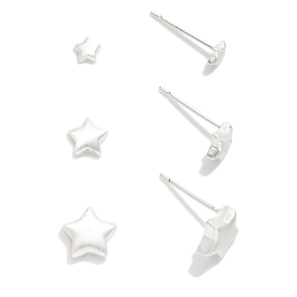 Set Of Three Metal Star Stud Earrings 

- Approximately .25"D 