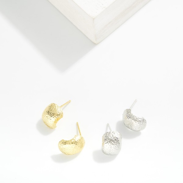 Textured Metal Tone Half Circle Stud Earring 

- Approximately .5" L 
- Gold Dipped 