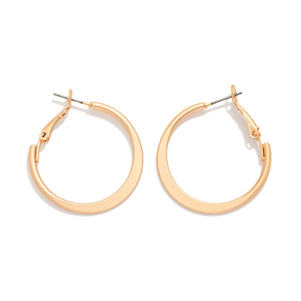 Metal Tone Tapered Flat Hoop Earrings 

- Approximately 1" D