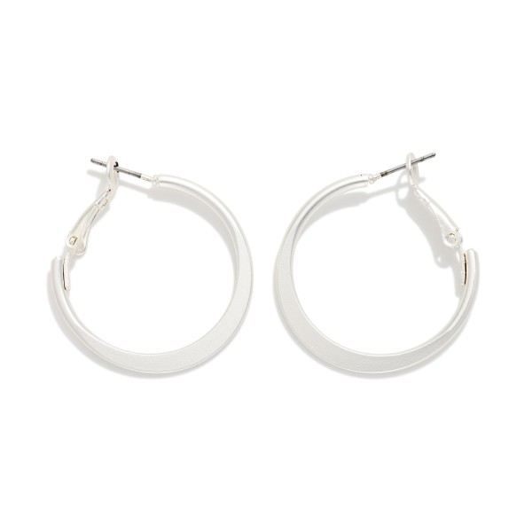 Metal Tone Tapered Flat Hoop Earrings 

- Approximately 1" D