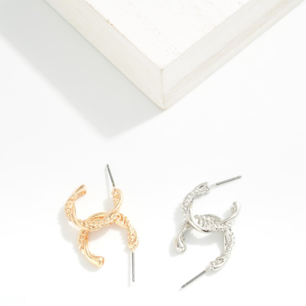 Double Twist Metal Hoop Earrings 

- Approximately .5" D