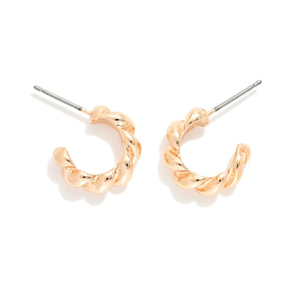 Metal Tone Twisted Hoop Earrings 

- Approximately .5" D
