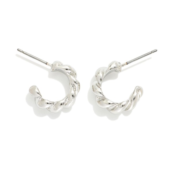 Metal Tone Twisted Hoop Earrings 

- Approximately .5" D