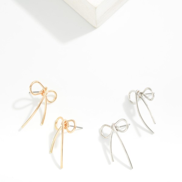 Metal Tone Knotted Bow Post Drop Earrings 

- Approximately 1" L