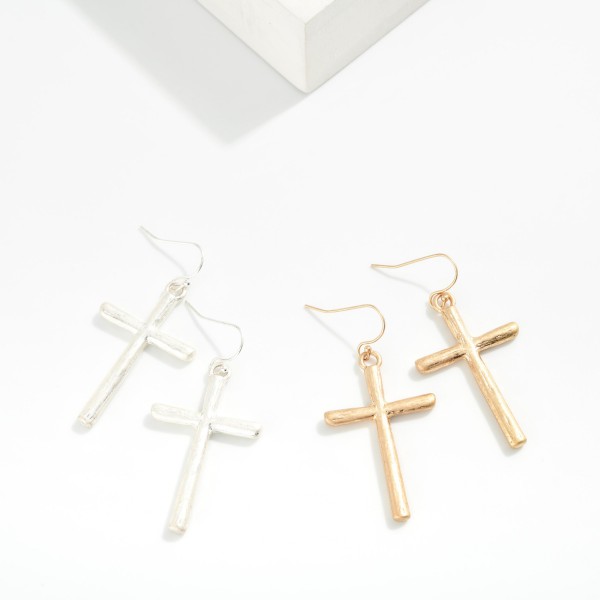 Worn Metal Tone Cross Drop Earrings

- Approximately 2" L  