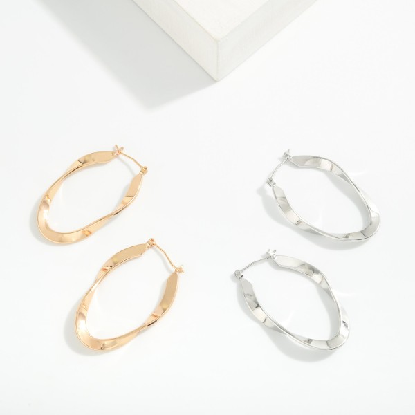 Flat Wavy Metal Hoop Earrings 

- Approximately 1.5" L