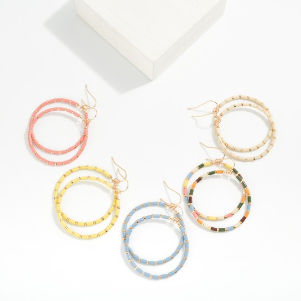Tube Beaded Hoop Drop Earrings Featuring Metal Tone Stations 

- Approximately 2" L 

