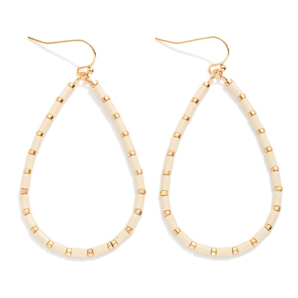 Tube Beaded Teardrop Drop Earrings Featuring Metal Tone Stations 

- Approximately 2" L 