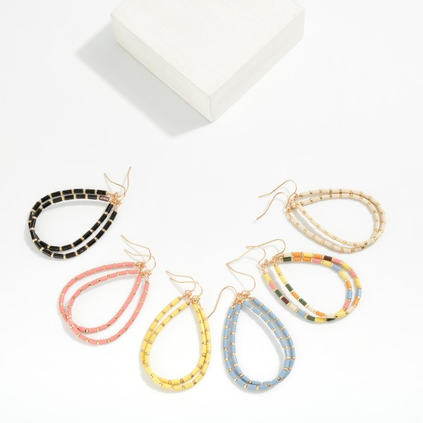 Tube Beaded Teardrop Drop Earrings Featuring Metal Tone Stations 

- Approximately 2" L 