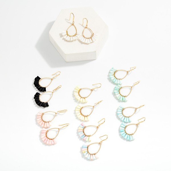 Textured Metal & Rhinestone Teardrop Earrings Featuring Fanned Marbled Acetate Beads

- Approximately 2" L