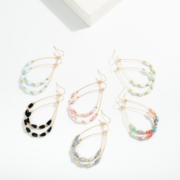 Wire Teardrop Earrings Featuring Faceted Cylinder Beads 

- Approximately 2.25" L