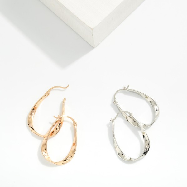 Simple Hollow U Hoop Drop Earring 

- Approximately 1.5" L 