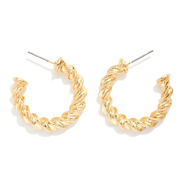 Twisted Metal Hoop Earrings 

- Approximately 1" D