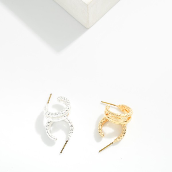 Layered Metal Tone Hoop Drop Earring Featuring Twisted Metal 

- Approximately .25" D 