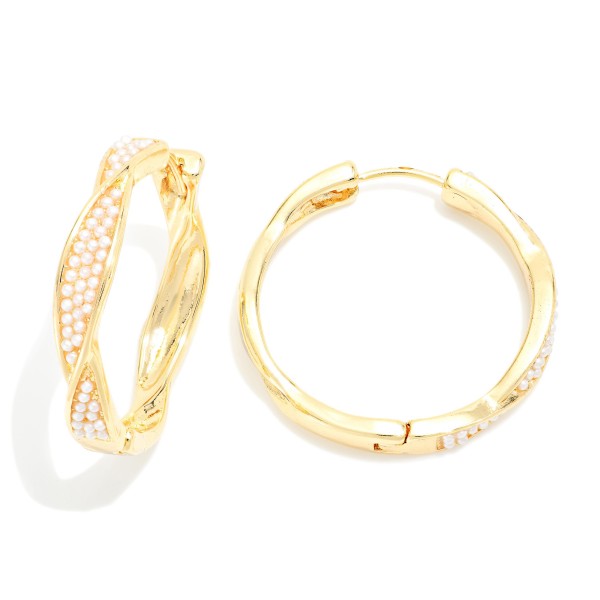 Twisted Metal Tone Huggie Hoop Drop Earring Featuring Studded Pearls 

- Approximately 1.05"