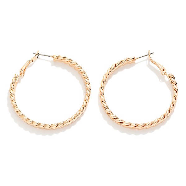 Twisted Flat Metal Hoop Earrings 

- Approximately 1.75" D