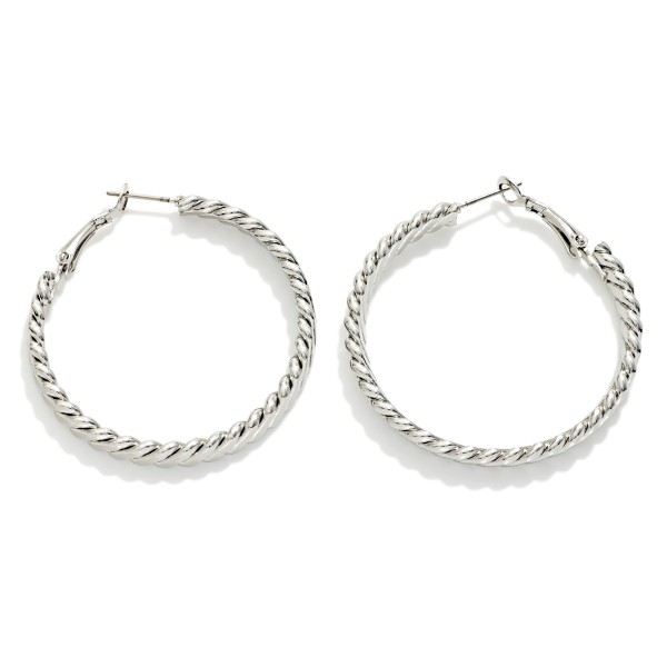 Twisted Flat Metal Hoop Earrings 

- Approximately 1.75" D