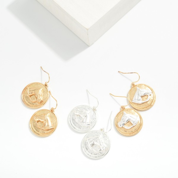 Metal Tone Medallion Drop Earring Featuring Metal Tone Horse Detail 

- Approximately 1.5" L 