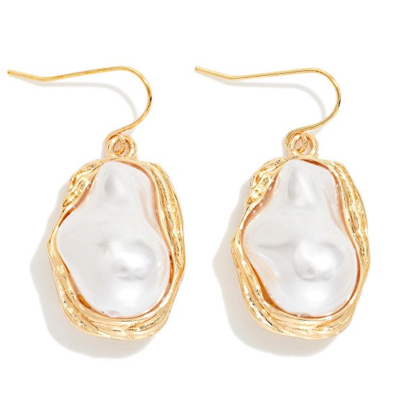 Metal Tone Baroque Pearl Drop Earring Featuring Metal Tone Border 

- Approximately 1.5" L