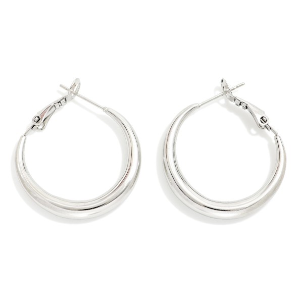Tapered Metal Hoop Earrings 

- Stainless Steel 
- Approximately .75" D